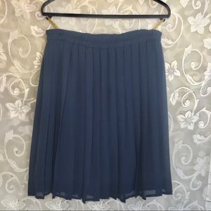 Fun and light-weight pleated ladies navy skirt